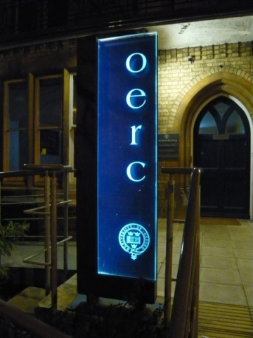 edge lit glass sign illuminated Oxford London