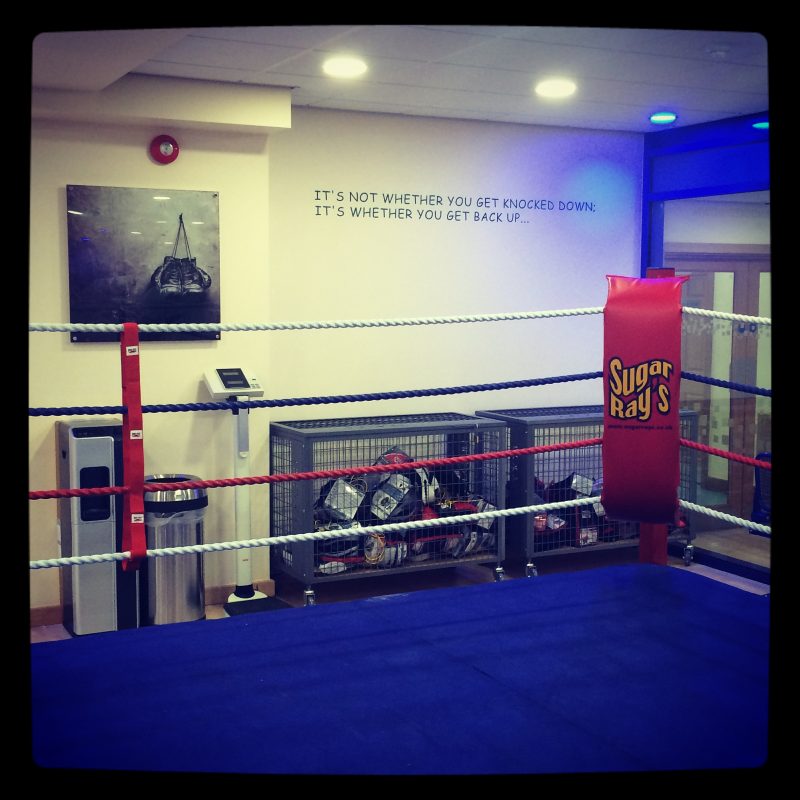 sporting quotes vinyl lettering applied to wall